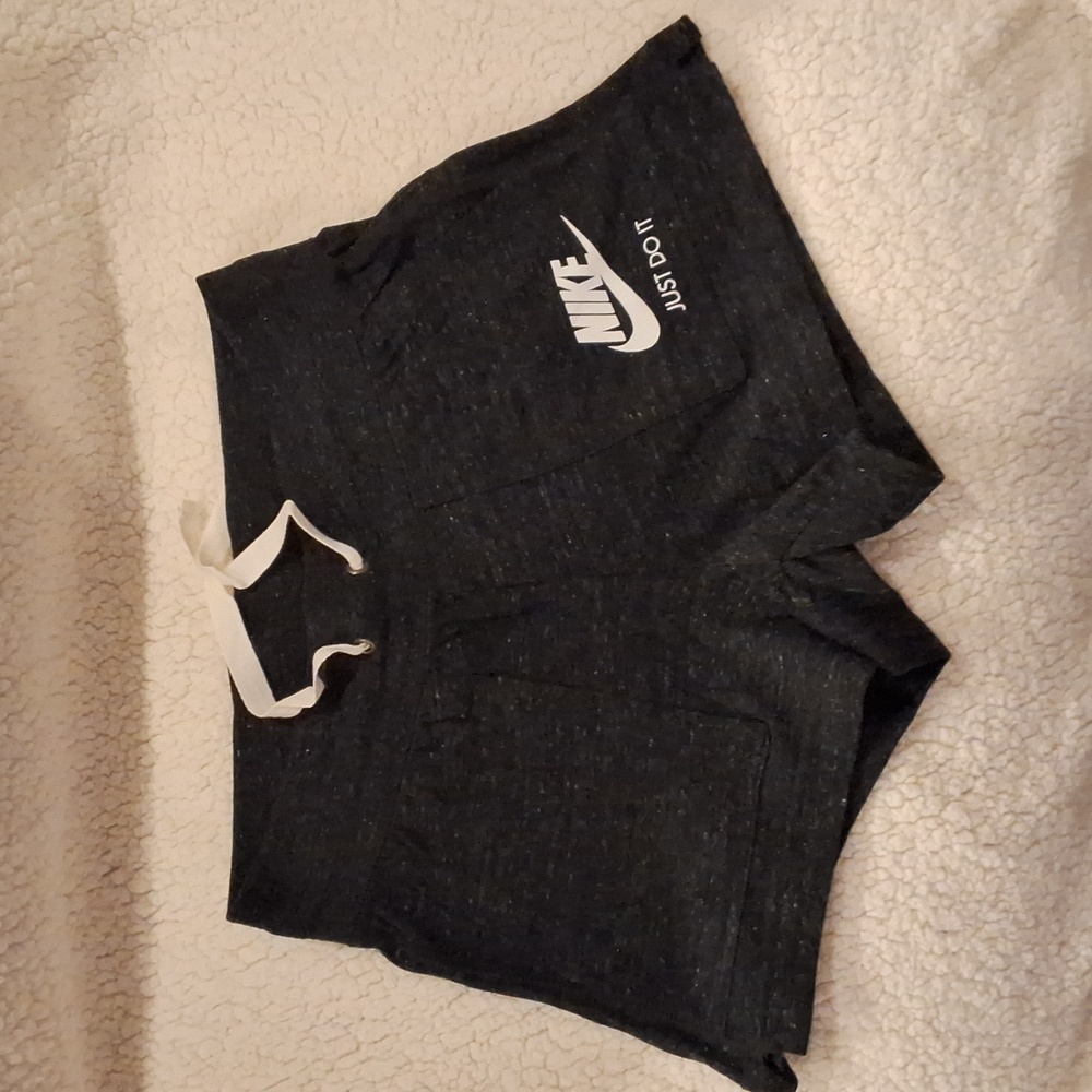 NIKE Women's shorts, black sail color, size small.